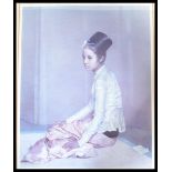 A vintage 20th Century 1960's Tretchikoff print depicting and Oriental Girl in traditional