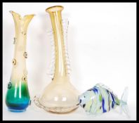 A selection of retro 20th Century studio glass to include a yellow glass vase having a bulbous