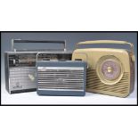 A group of three vintage retro 20th Century radios to include a Grundig Yacht Boy, Hacker radio