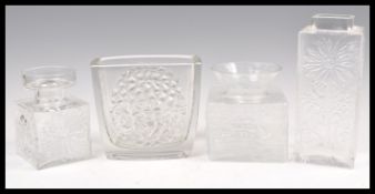 A group of four vintage retro 20th Century clear studio art glass vases to include three Frank