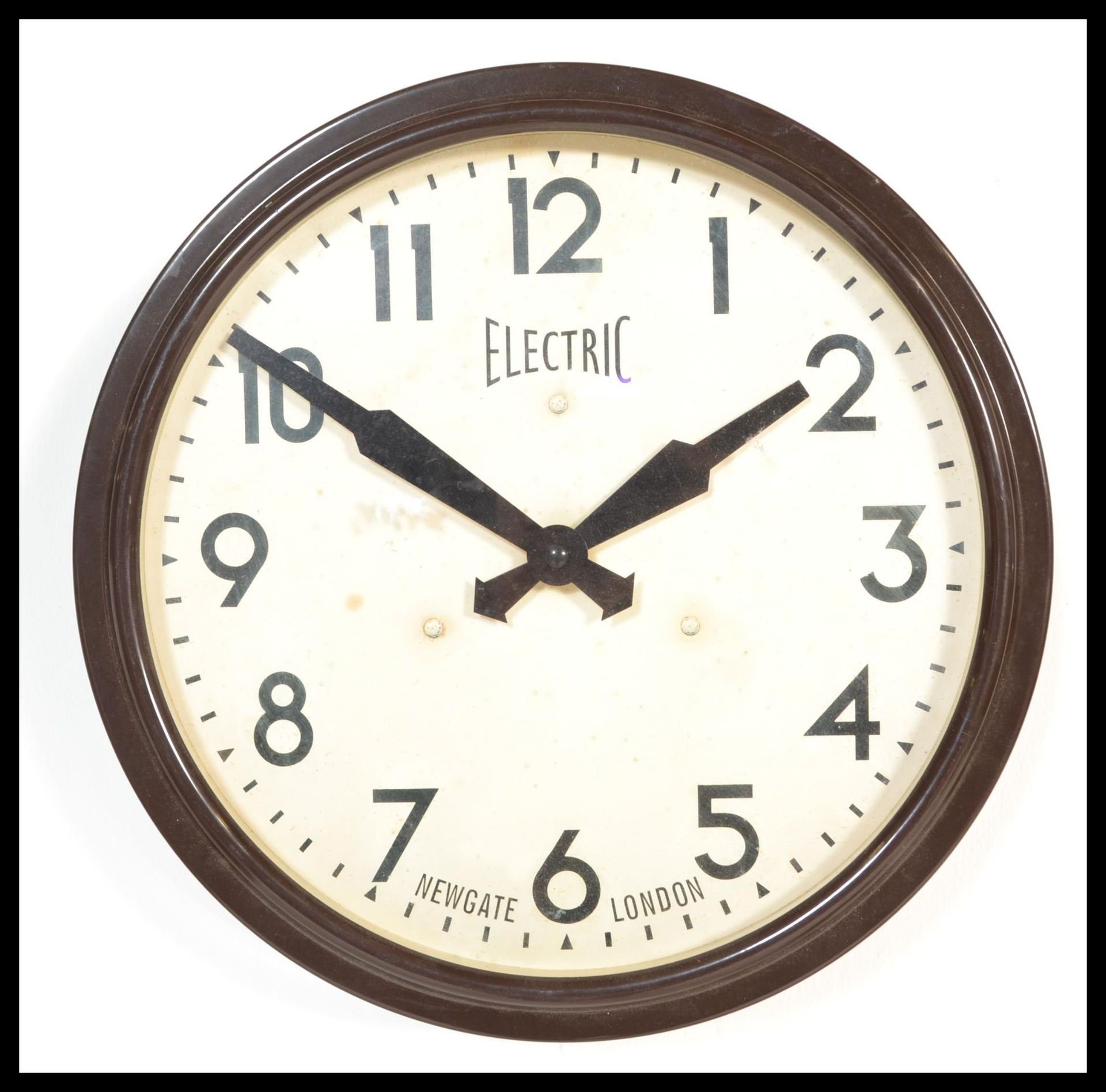 A vintage retro 20th century industrial  factory / school wall clock of circular form with