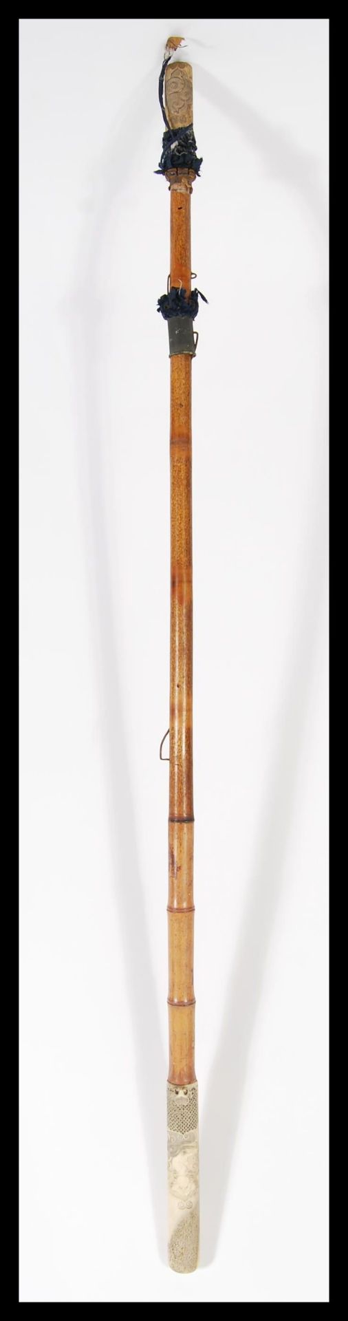 A 19th Century Chinese Cantonese bone handled partial parasol having a carved bone handle