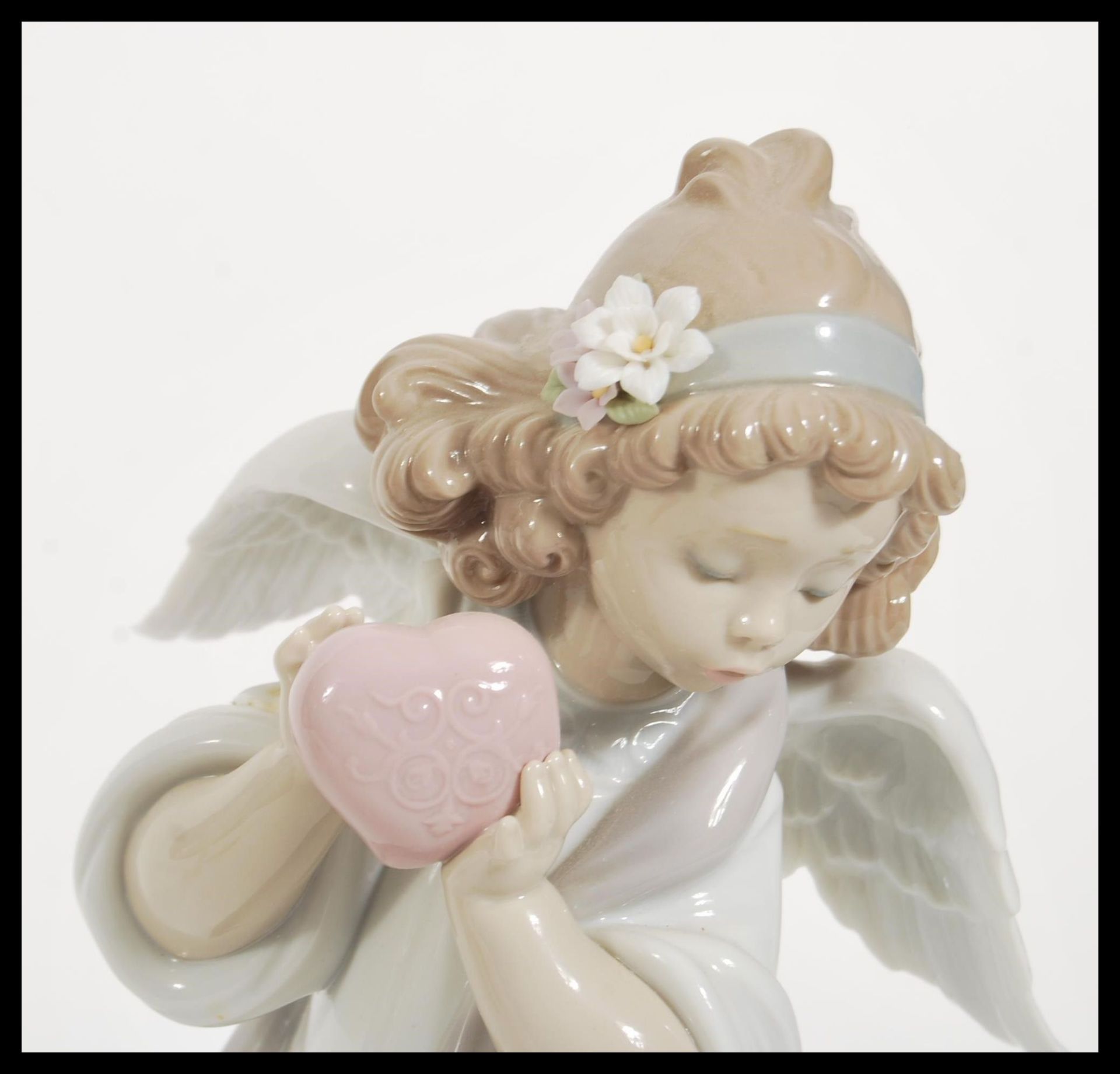 A Lladro ceramic figurine entitled ' Loving The World '  depicting an angel with flowers to hair - Image 3 of 4