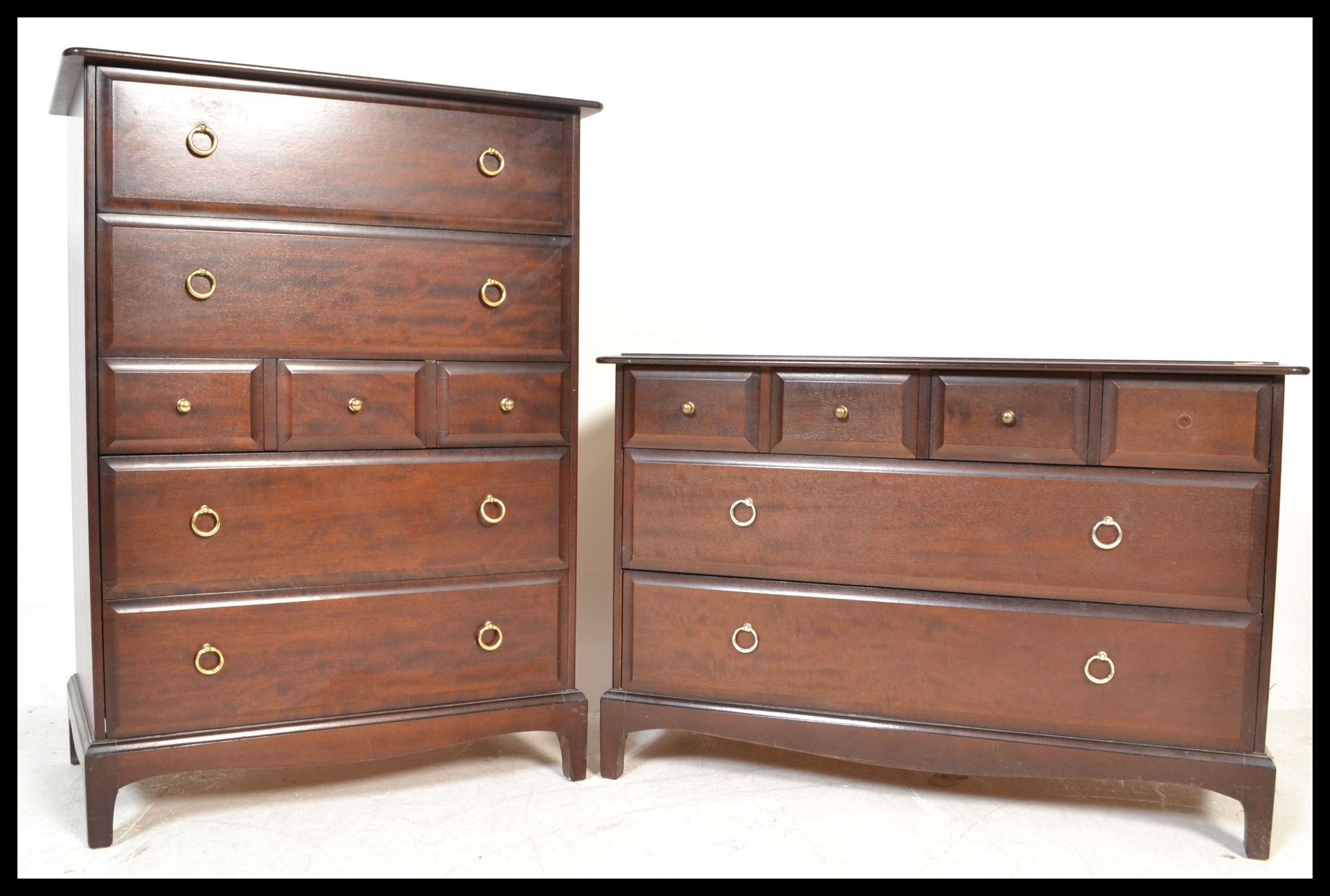 A Stag Minstrel mahogany tallboy chest of four long and three short drawers together with a matching