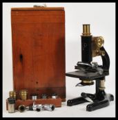 An early 20th century Rectiform JH Steward of 406 Strand London microscope no. 3359 being,