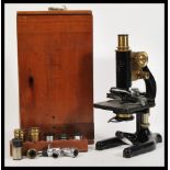 An early 20th century Rectiform JH Steward of 406 Strand London microscope no. 3359 being,