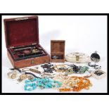 A good collection of vintage jewellery to include a Miracle rhinestone brooch, necklaces, perfume