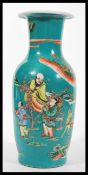 A 20th Century Chinese large porcelain temple vase having teal ground with hand painted and