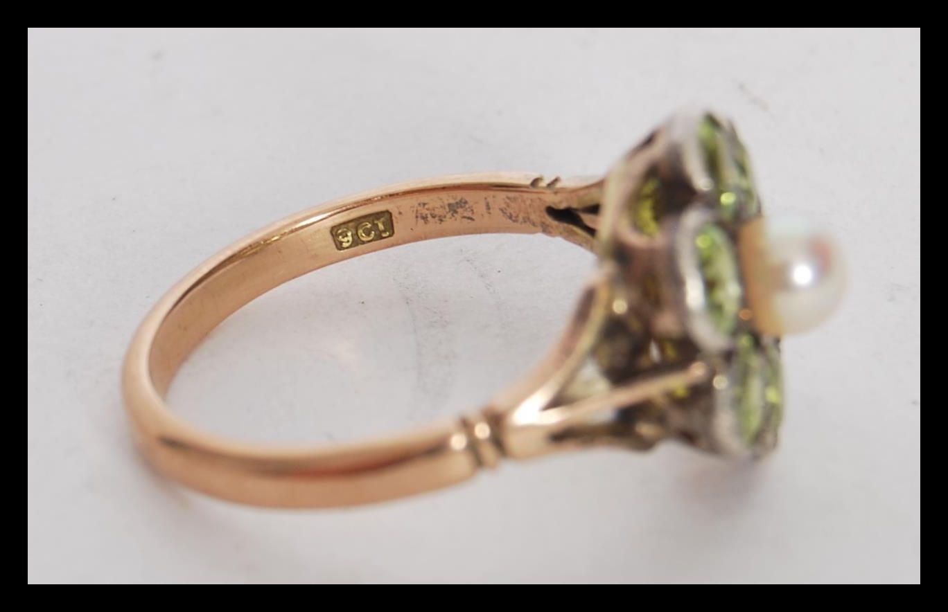 A stamped 9ct gold ring having a flower head seat with round cut peridots with a pearl to the - Image 4 of 4
