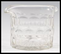 A 18th / 19th Century Georgian Regency cut glass rinser having twin pouring lips with large