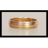 A 9ct gold hallmarked wedding ring band, having marks for Sheffield 1962. Weight: 2.3g size O.5.