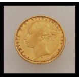 A 1876 Victorian full gold sovereign stamped for the Sydney mint. Weight 8.0g.