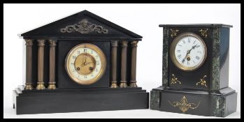 Two 19th Century Victorian black marble slate mantel clocks one of arched form and the other being a
