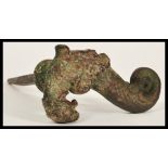 An unusual believed 18th Century French bronze Church door handle in the form of a griffin having