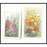 Muriel England English 20th Century - A pair of still life oil paintings depicting flowers set to