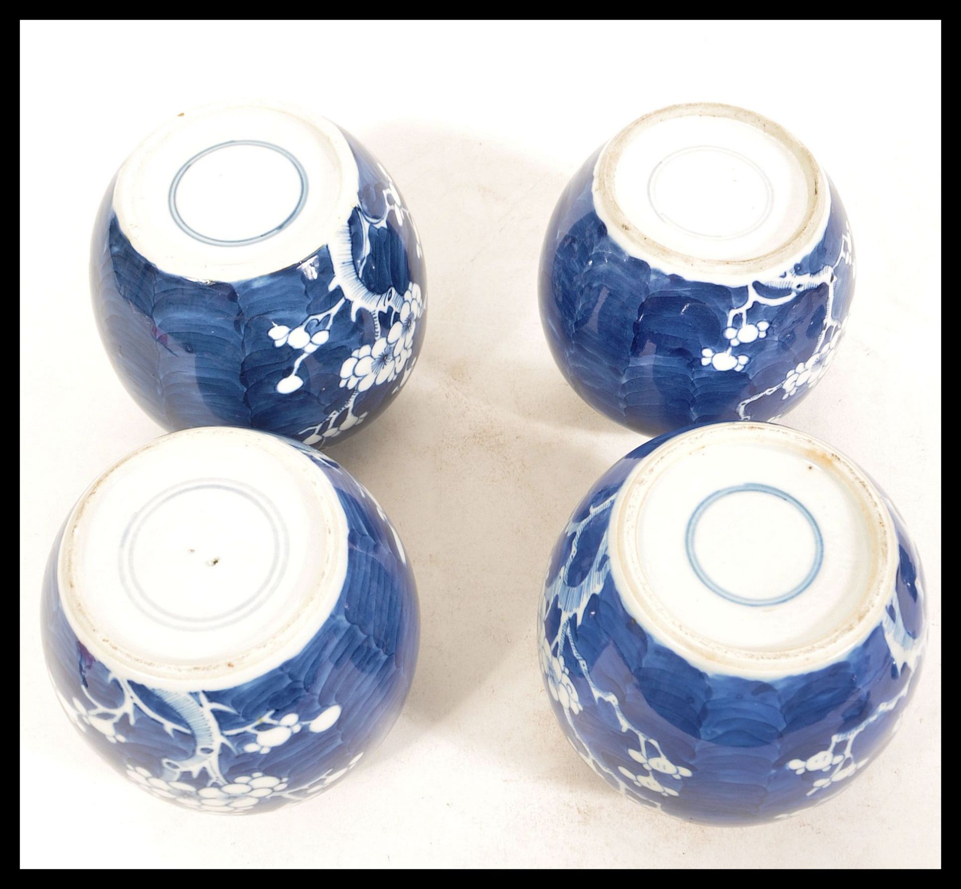 Two early 20th Century Chinese blue and white ginger jars in the Prunus pattern both having double - Image 3 of 3