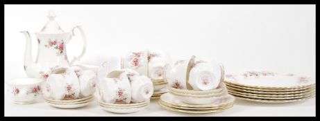 A mid 20th Century Royal Albert bone China tea service in the Lavender Rose pattern, the twelve