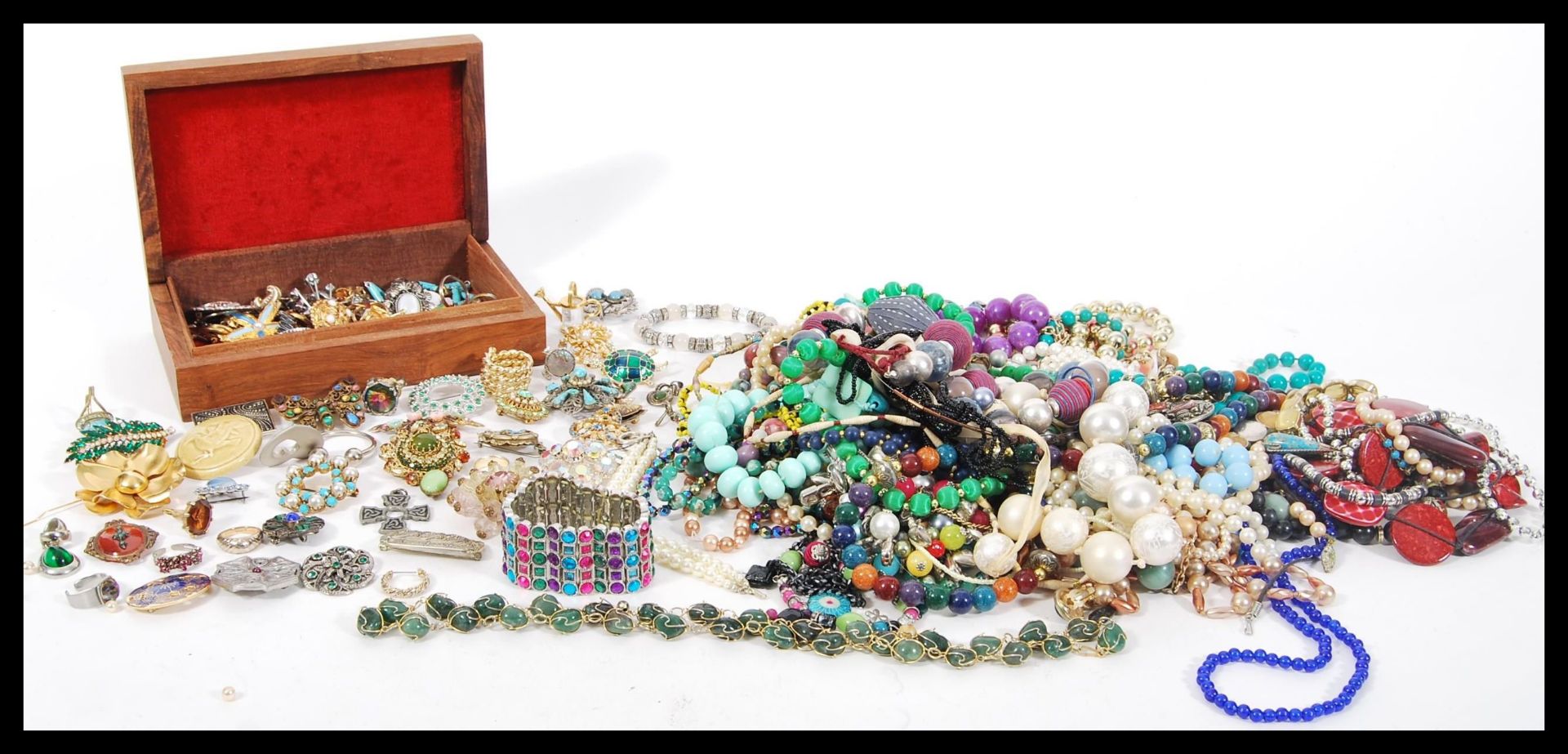 A collection of vintage costume jewellery to include many brooches, earrings, bracelets, rings,