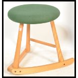 A 20th Century contemporary stool by the Wave Seat Company Keswick Cumbria, the beech frame of