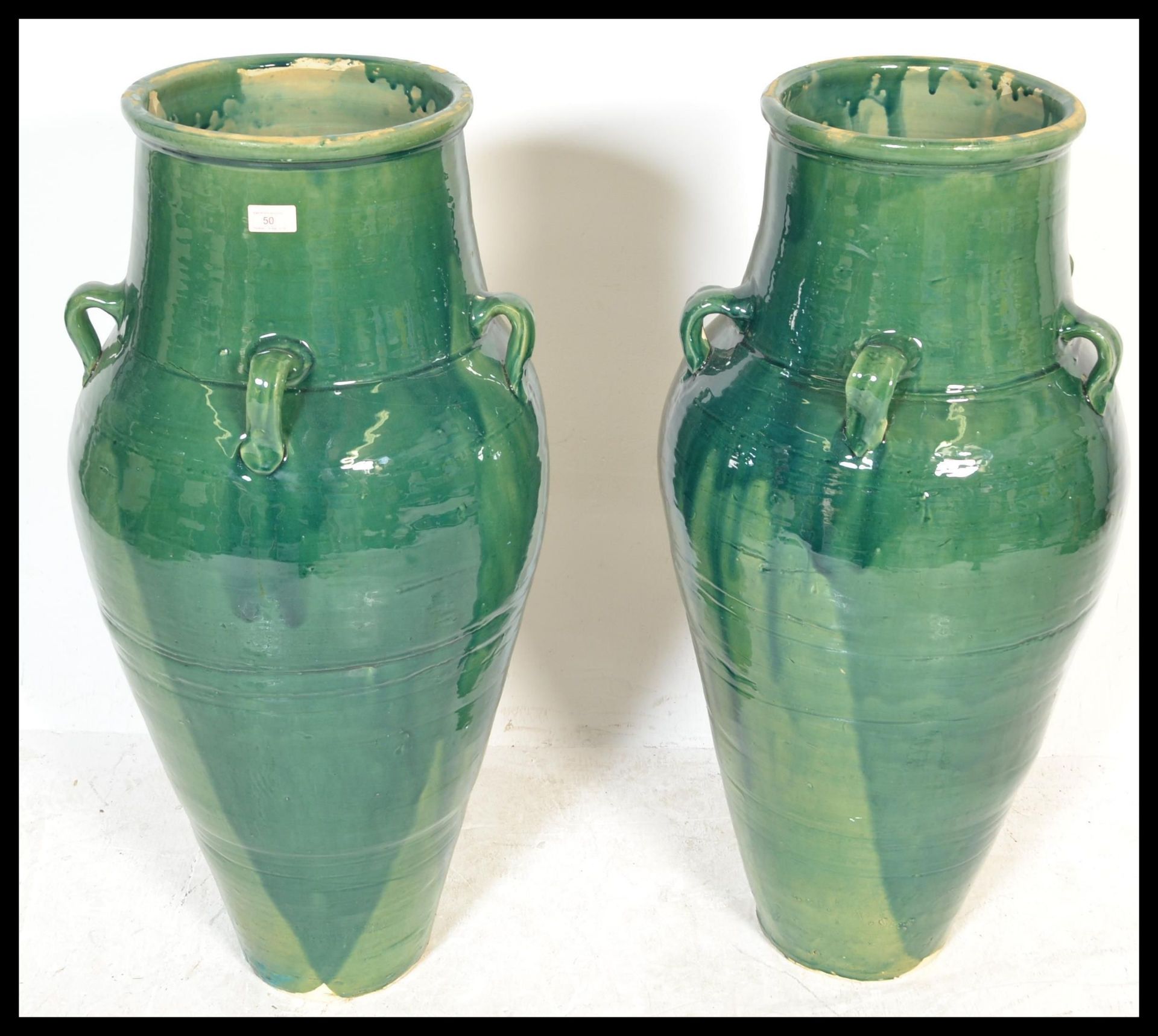 A large and impressive pair of Persian Sharab green glazed wine vessels of amfora form having four - Bild 4 aus 6