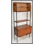 A vintage retro 20th Century teak wood Avalon modular system having an arrangement of shelves and