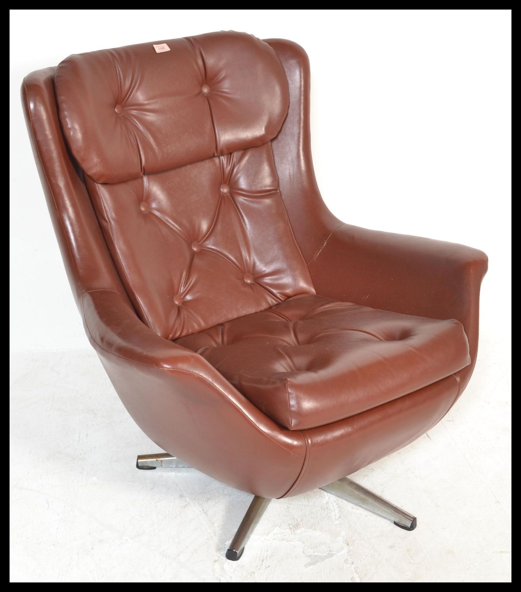 An original 1960's retro vintage button back swivel egg type chair / armchair being raised on a five - Bild 3 aus 6