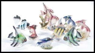 A collection of nine vintage retro 20th Century ceramic lustreware models of tropical fish figures