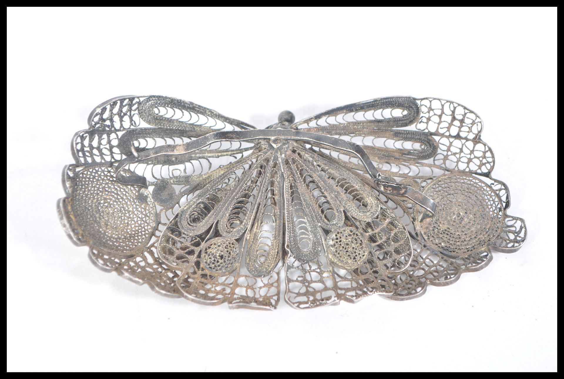 A large antique silver filigree brooch in the form of a butterfly along with a silver brooch - Image 3 of 4
