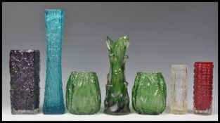 A collection of seven vintage 20th Century studio art glass in the manner of Geoffrey Baxter for