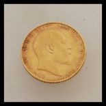 A 1905 Edward VII London mint full gold sovereign. Weight 8.0g.