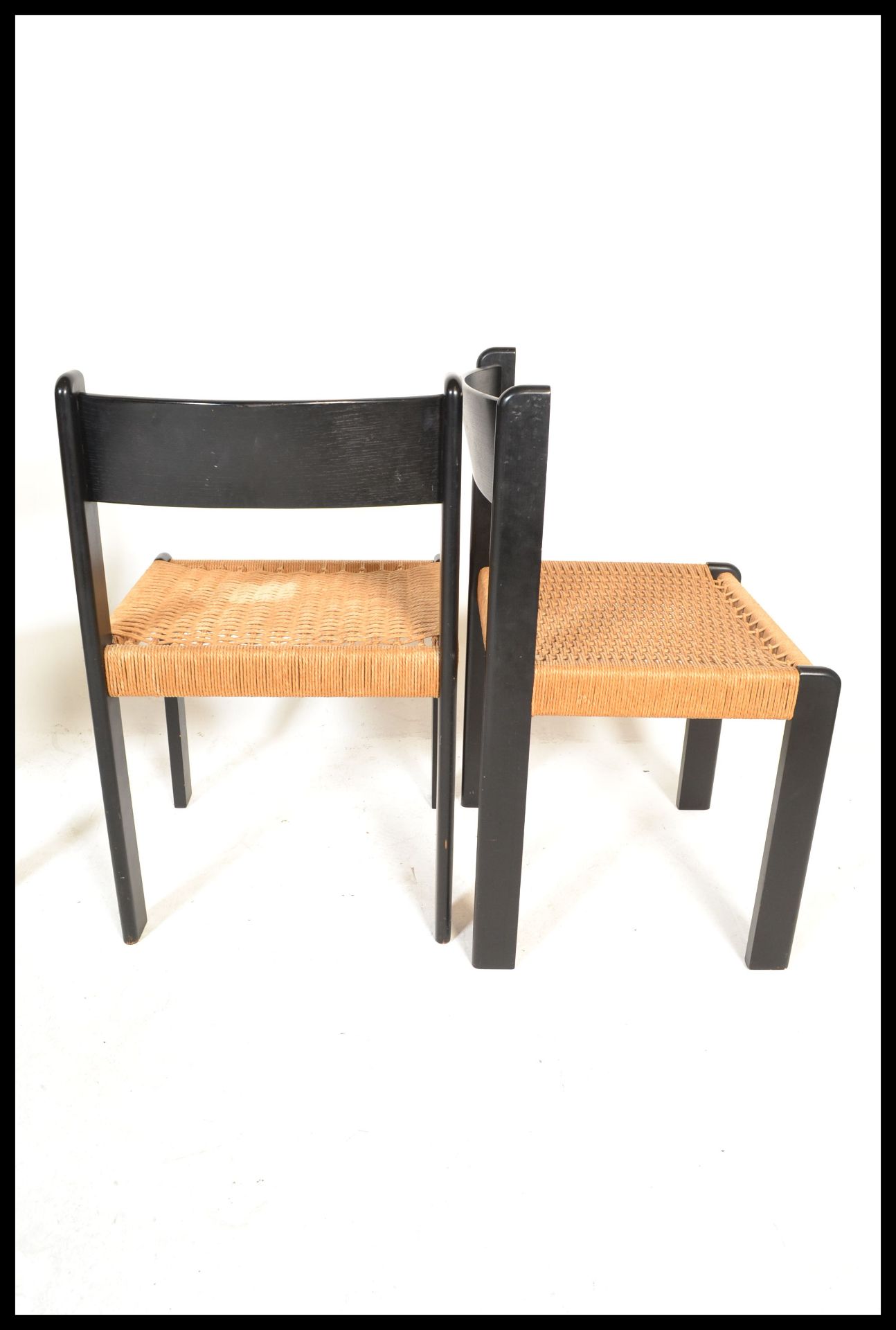 A set of four vintage retro 20th Century Danish dining chairs raised on ebonised beech frames with - Bild 3 aus 4