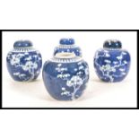 Two early 20th Century Chinese blue and white ginger jars in the Prunus pattern both having double