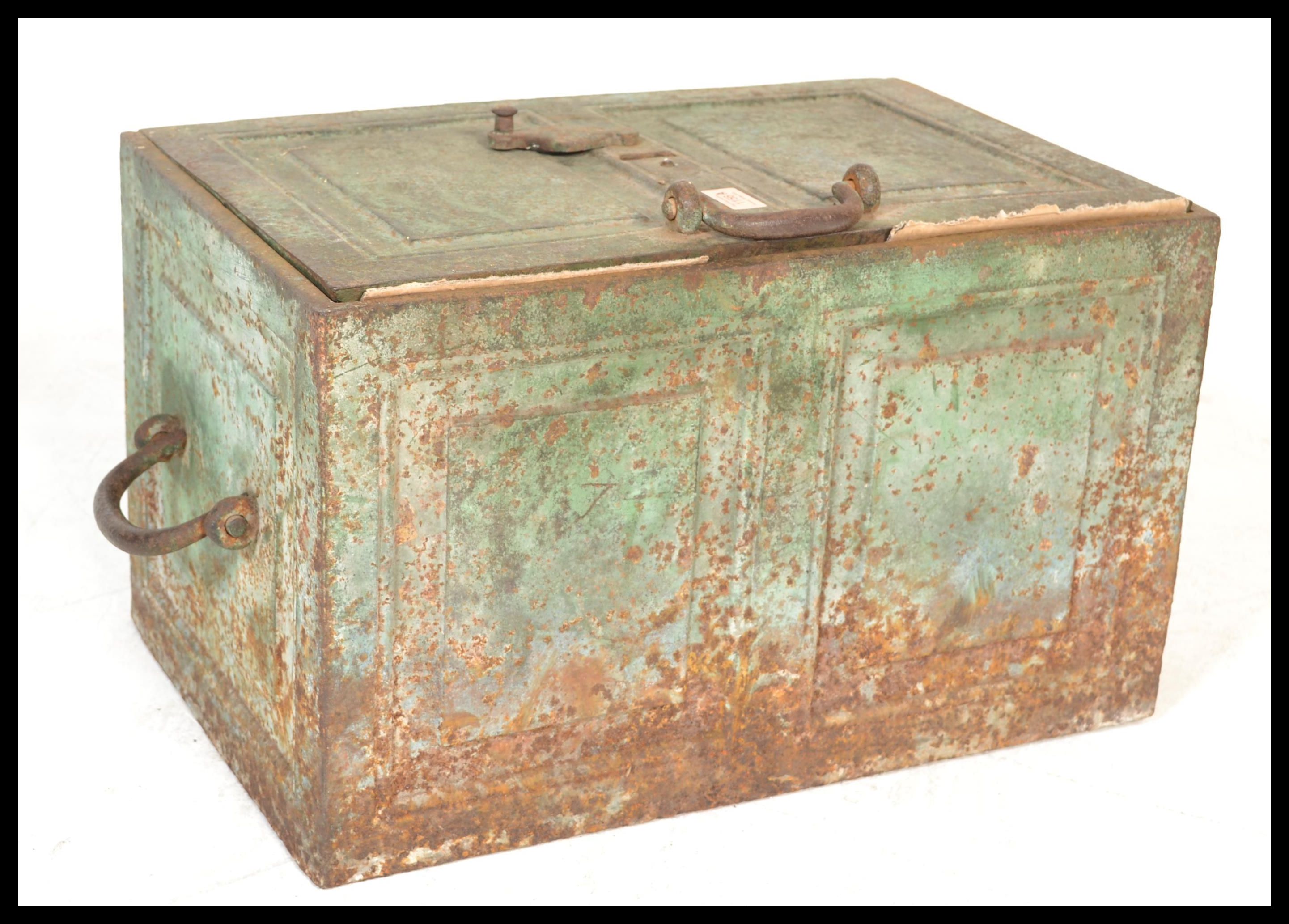 A late 19th Century Victorian strong box, carry handles to the side, hinged door and key whole to