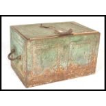 A late 19th Century Victorian strong box, carry handles to the side, hinged door and key whole to