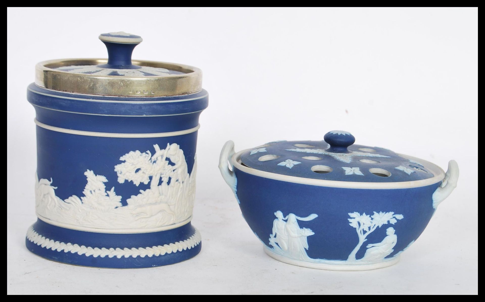 A 19th century Wedgwood blue jasperware cameo pot pourri bowl and lid with twin handles. Together