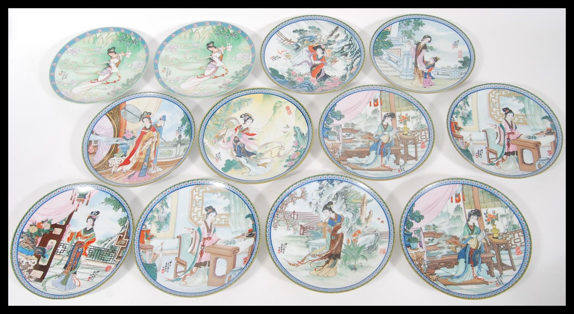 A collection of twelve 1989 Imperial Jingdezhen porcelain decorative collectors plates, depicting