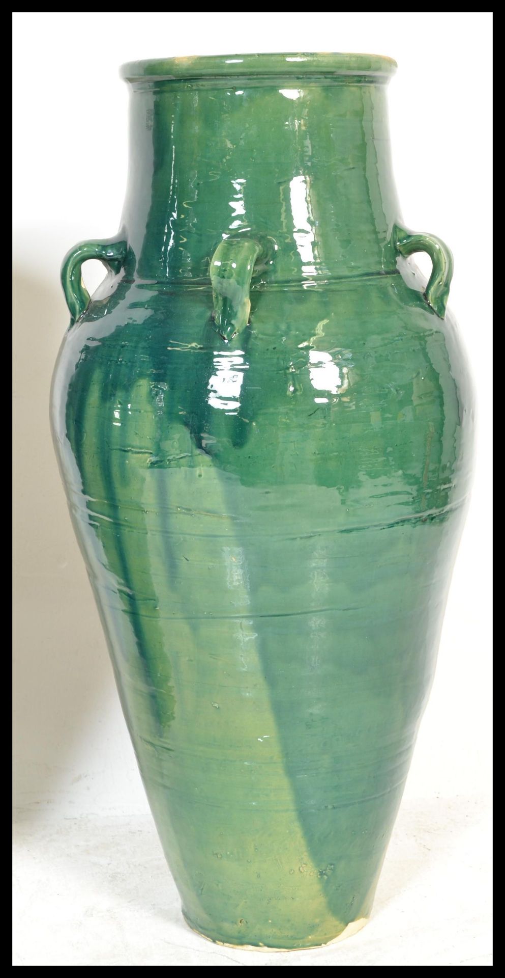 A large and impressive pair of Persian Sharab green glazed wine vessels of amfora form having four - Bild 3 aus 6