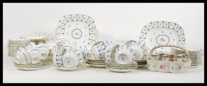 An extensive Coalport dinner and tea service in the 6978 pattern consisting of twelve breakfast