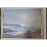 A original oil on canvas painting of a coastal scene depicting a seascape under stormy skies.