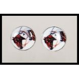 A pair of stamped 925 silver cufflinks set with round enamelled panels depicting horses. Weight 10.