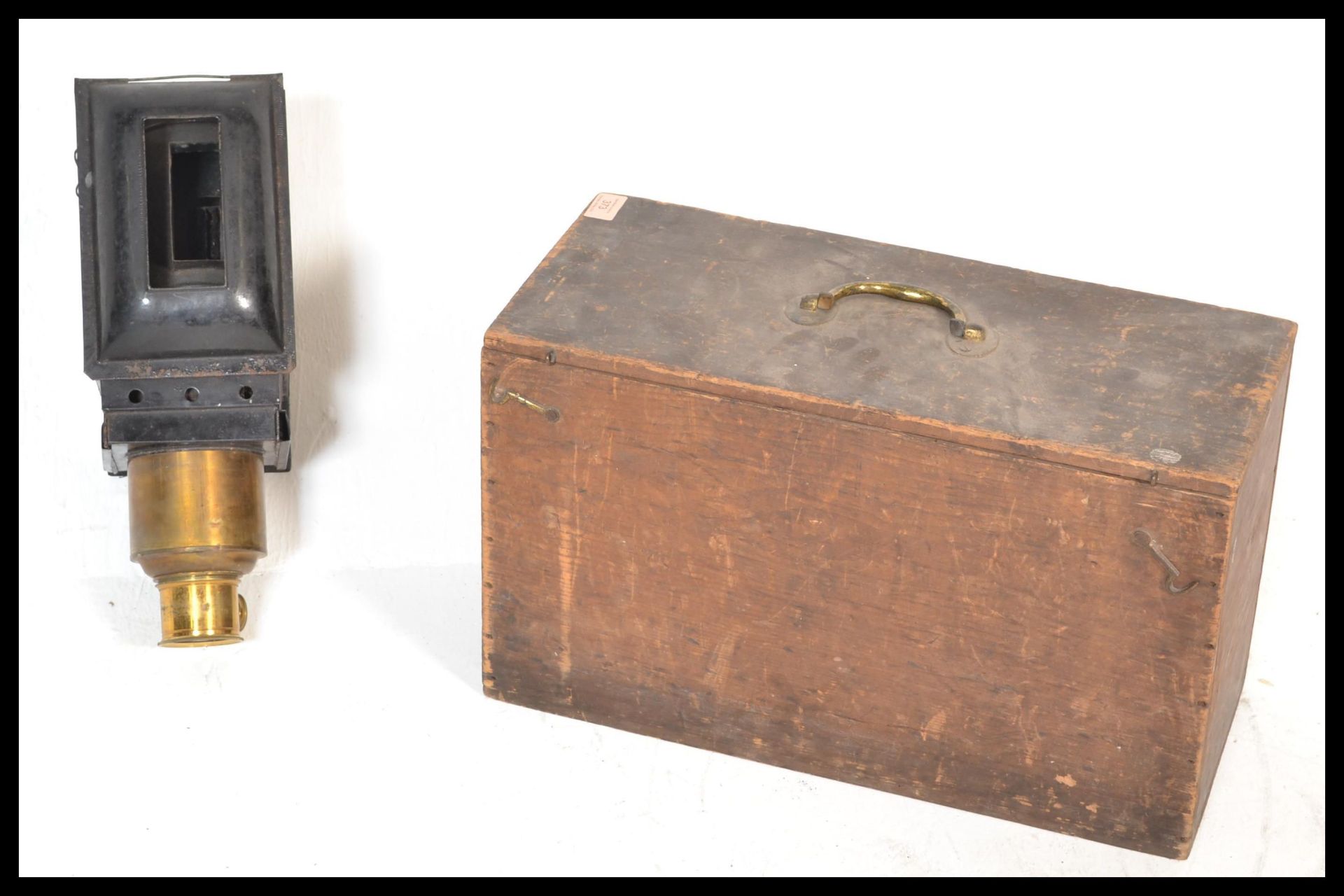 A vintage early 20th century magic lantern slide viewer of wooden and brass construction set