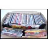 A collection of forty cased DVD films to include Taxi Driver, Rambo, Aliens, Predator, King Kong,