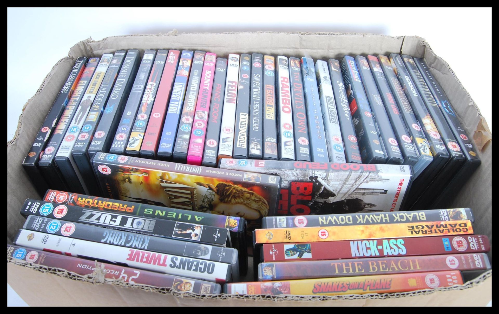 A collection of forty cased DVD films to include Taxi Driver, Rambo, Aliens, Predator, King Kong,