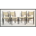 A set of four vintage 20th Century retro Ernest Gomme G-Plan / G Plan dining chairs raised on