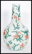 A large 20th Century Chinese porcelain vase of baluster form having famille verte decoration with
