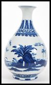 A 20th Century Chinese blue and white porcelain vase of baluster form having hand painted scenes