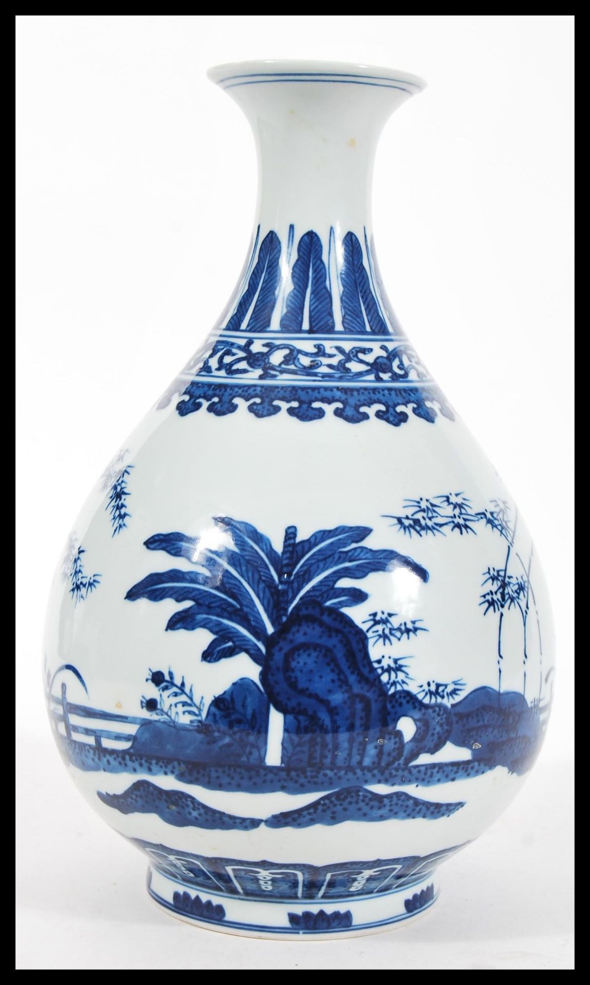 A 20th Century Chinese blue and white porcelain vase of baluster form having hand painted scenes