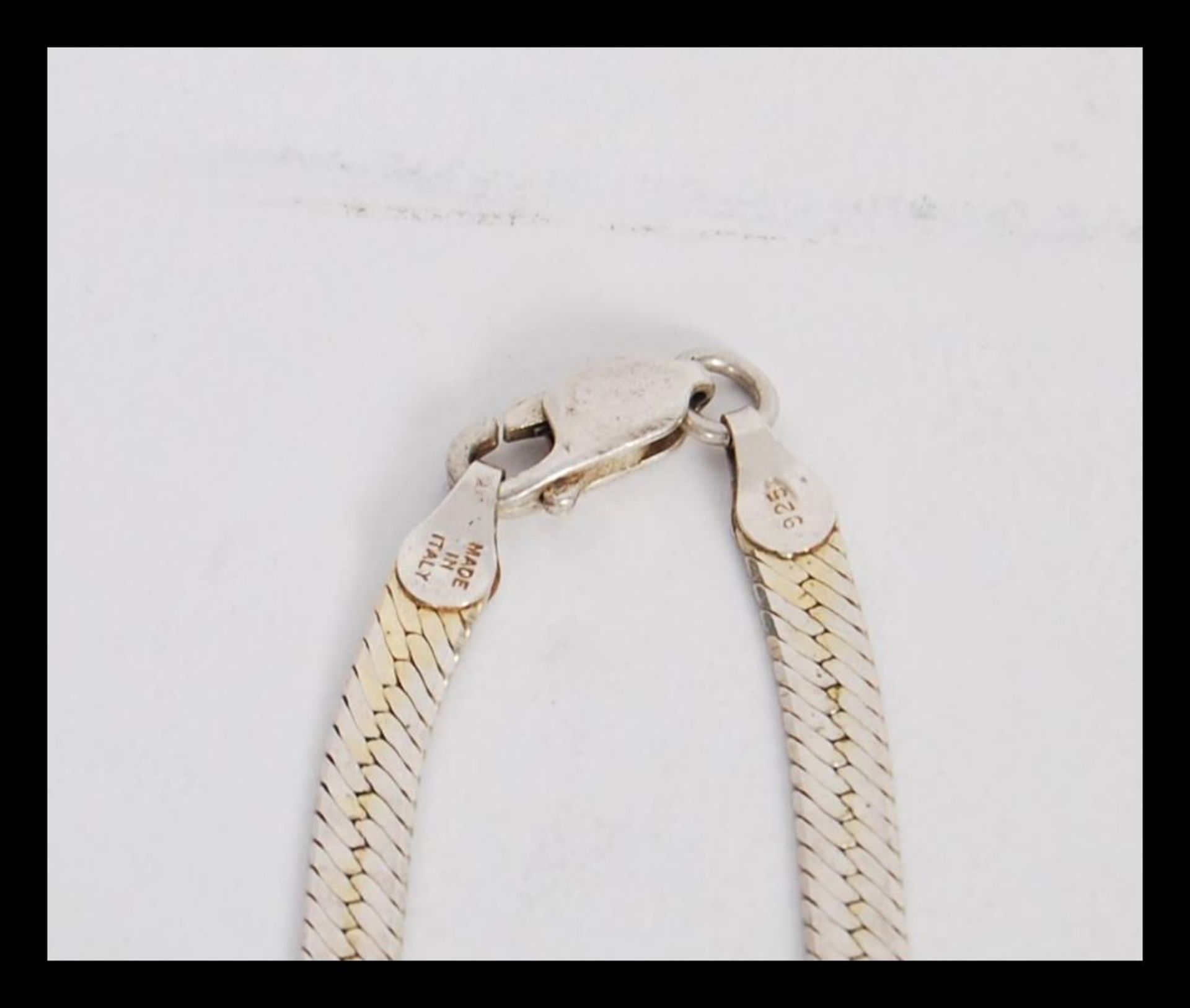 Three stamped 925 silver necklaces to include a flat linked snake chain, a flat linked necklace with - Image 5 of 5