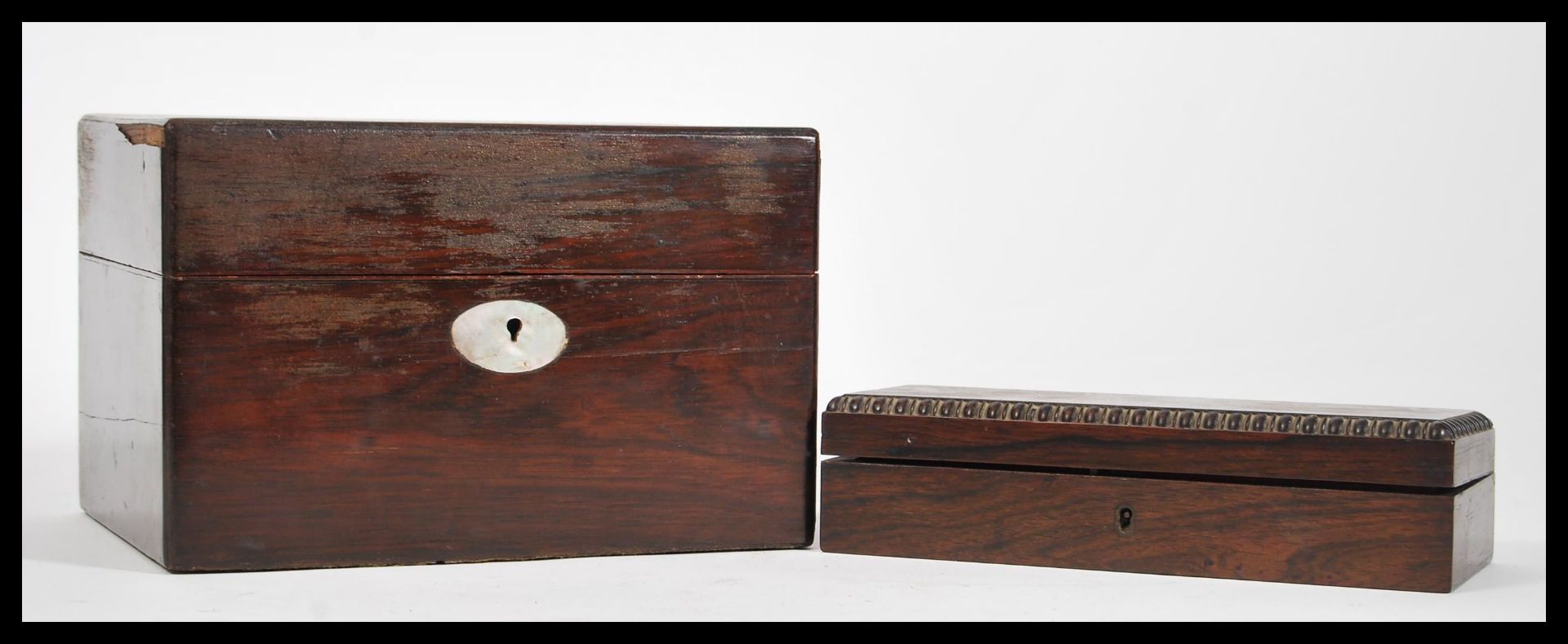 Two 19th Century rosewood boxes to include a jewellery box with mother of pearl panel and a