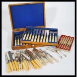 A collection of silver plated flatware to include a oak cased silver plate cutlery set, boxed